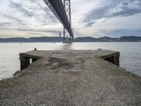 Dawn Over Coastal Bridge in Lisbon, Portugal