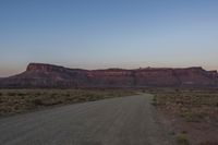 Dawn Over Desert Road and Low-Lying Mountains