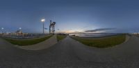 a view through the side walk shows the time and distance of a ship on shore