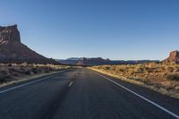 Dawn on a Highland Road: Low Asphalt and Clear Sky