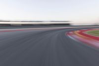 Dawn on the Highway: Straight Road Lined with Asphalt