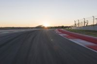 Dawn Highway: Automobile Racing at Sunrise