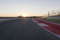 Dawn Highway: Automobile Racing at Sunrise