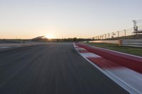 Dawn Highway: Automobile Racing at Sunrise