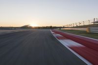 Dawn Highway: Automobile Racing at Sunrise