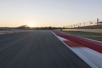 Dawn Highway: Automobile Racing at Sunrise