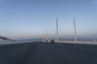 Dawn on the Highway Bridge: Clear Sky and Open Road