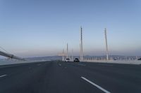 Dawn on the Highway Bridge: Clear Sky and Open Road