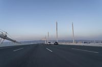 Dawn on the Highway Bridge: Clear Sky and Open Road