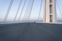 Dawn on the Highway: Morning Commute on a Bridge with Clear Skies