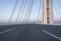 Dawn on the Highway: Morning Commute on a Bridge with Clear Skies