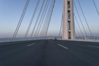 Dawn on the Highway: Morning Commute on a Bridge with Clear Skies