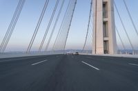 Dawn on the Highway: Morning Commute on a Bridge with Clear Skies