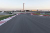 Dawn on the Highway: Racing at the Stadium under a Clear Sky