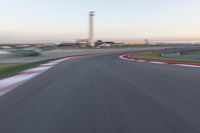 Dawn on the Highway: Racing at the Stadium under a Clear Sky