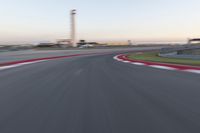 Dawn on the Highway: Racing at the Stadium under a Clear Sky