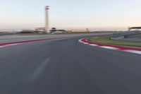 Dawn on the Highway: Racing at the Stadium under a Clear Sky