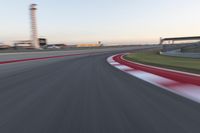 Dawn on the Highway: Racing at the Stadium under a Clear Sky