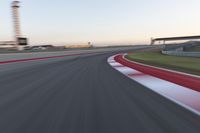 Dawn on the Highway: Racing at the Stadium under a Clear Sky