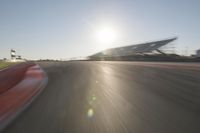 Dawn on the Horizon: Asphalt Road in the Landscape