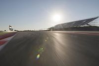 Dawn on the Horizon: Asphalt Road in the Landscape