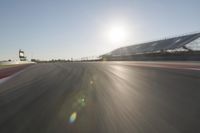 Dawn on the Horizon: Asphalt Road in the Landscape