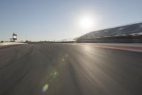 Dawn on the Horizon: Asphalt Road in the Landscape