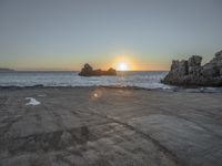 Dawn at the Horizon: Sunlit Beach and Ocean