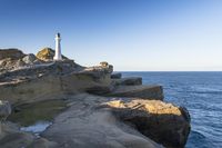 Dawn on the Horizon: Clear Sky over Water