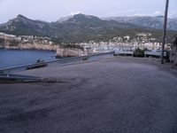 some hills and hills, with the road going to the boat yard, on the other side