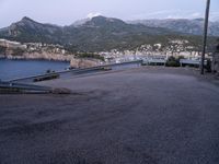 some hills and hills, with the road going to the boat yard, on the other side