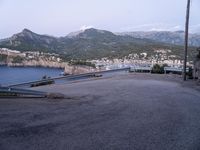 some hills and hills, with the road going to the boat yard, on the other side