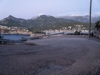 some hills and hills, with the road going to the boat yard, on the other side