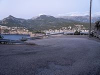 some hills and hills, with the road going to the boat yard, on the other side