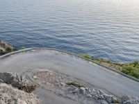 Dawn in Spain: Switchback Road with Ocean View