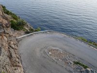 Dawn in Spain: Switchback Road with Ocean View