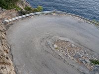 Dawn in Spain: Switchback Road with Ocean View