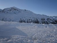 Dawn in the Alps: Snow Covered Mountain Range