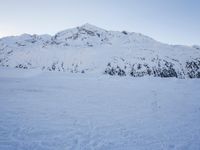 Dawn in the Alps: Snow Covered Mountain Range