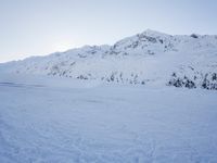 Dawn in the Alps: Snow Covered Mountain Range