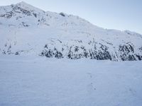 Dawn in the Alps: Snow Covered Mountain Range