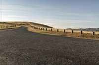 Dawn Landscape: Rolling Hills and Clear Skies with Trees