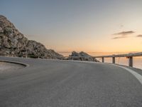 Dawn in Majorca, Spain: Road Curve Under Clouds