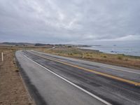 Dawn on California Coastline: Driving Along the Highway