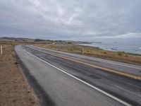 Dawn on California Coastline: Driving Along the Highway