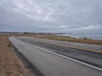 Dawn on California Coastline: Driving Along the Highway