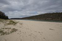 the sandy beach is empty, but there is nothing to see here in the water