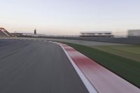 Dawn Over the Race Track: Clear Sky and Racing
