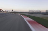 Dawn Over the Race Track: Clear Sky and Racing