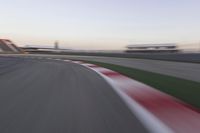 Dawn Over the Race Track: Clear Sky and Racing